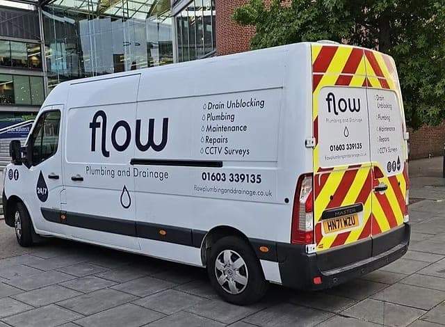 Flow Plumbing and Drainage van providing drainage services to the norwich library.
